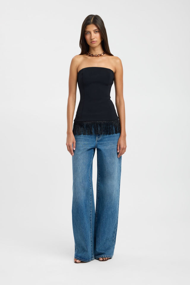 Discover the Alto Fringe Top womens blouse in black with fitted silhouette, straight neckline and sleeveless design front