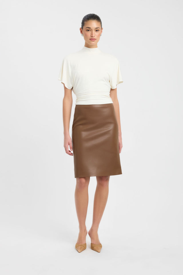 Showcasing the Harley Top womens blouse in ivory with fitted high-neck and short sleeves front