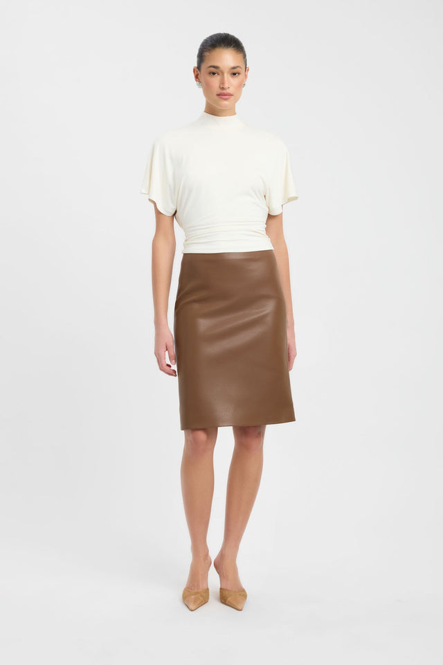 Featuring the Harley Top womens blouse in ivory with fitted high-neck and short sleeves side