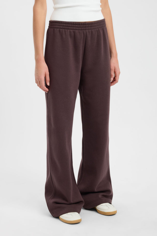 Showcasing the Tate Wide Leg Track Pant in womens regular pants with mid-rise and saddlebrown detail
