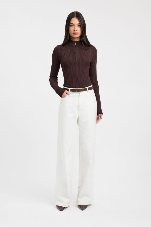 Showcasing the Bristol Zip Top womens blouse with saddle brown fitted high-neck full sleeves on-body