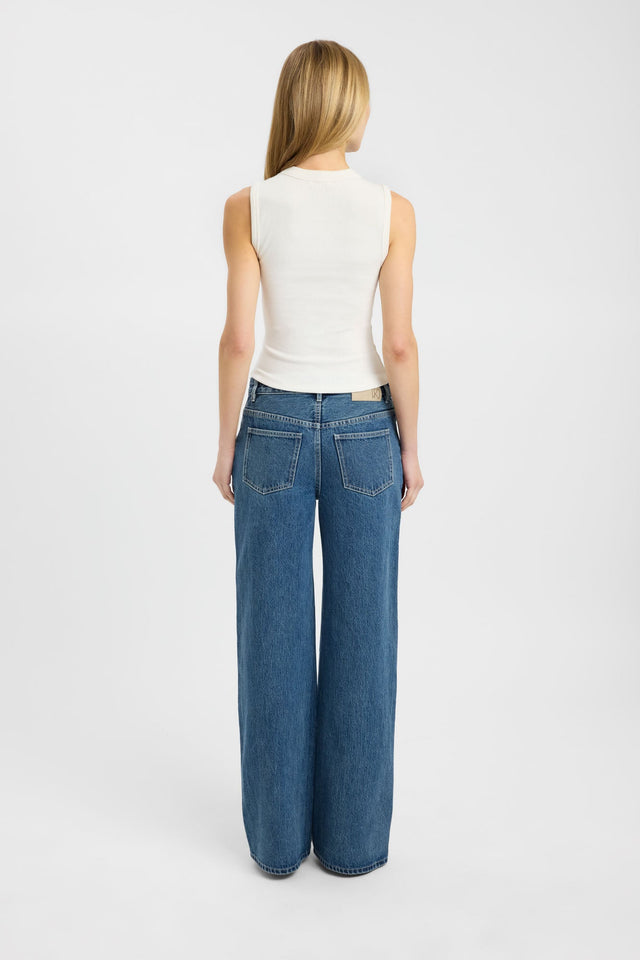 Showcasing the Violet Tank womens-blouse in ivory with fitted silhouette, v-neck and sleeveless design back
