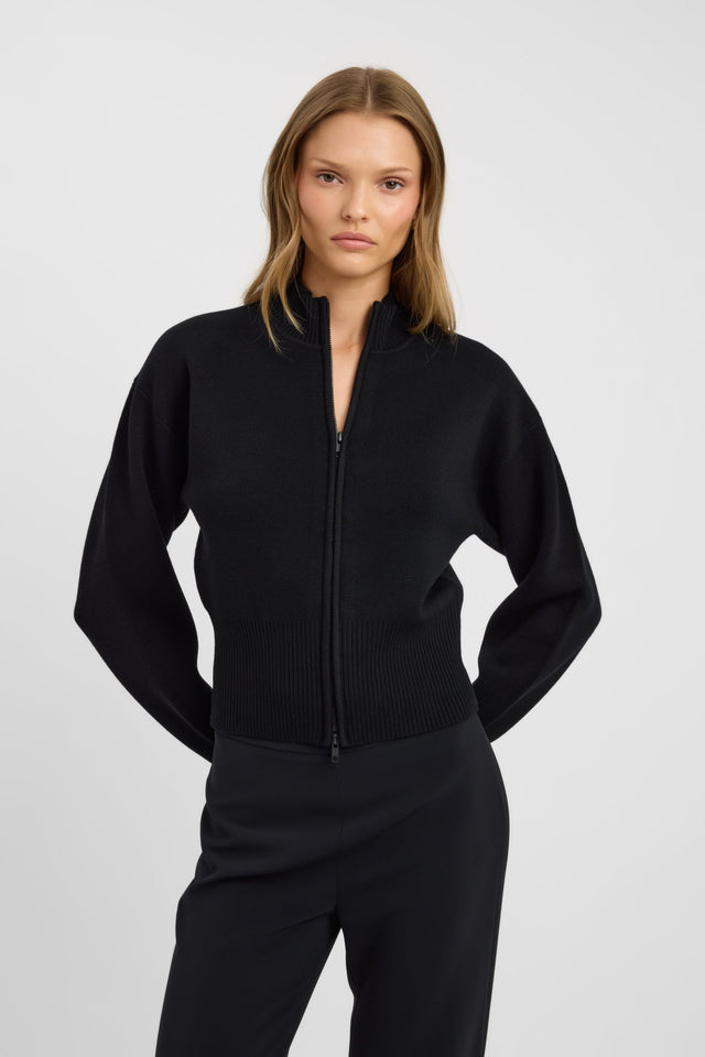 Highlighting the Dalton Zip Cardigan womens-jumpers with high-neck, fitted style in black on-body