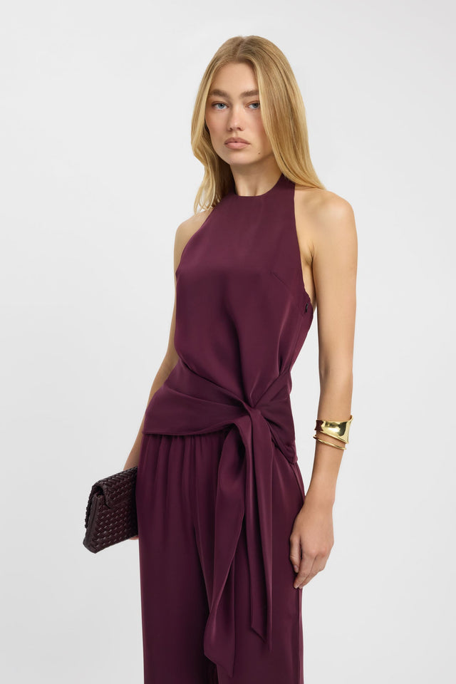 Showcasing the Maria Halter Wrap Top womens-blouse in maroon with fitted high-neck sleeveless design side