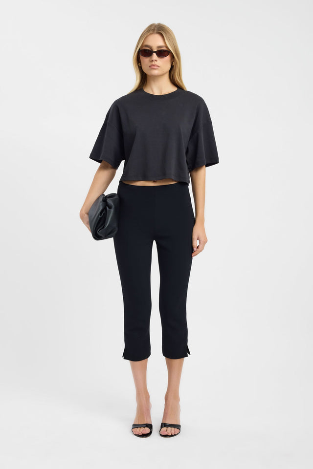 Showcasing the Halo Cropped Tee womens blouse in black with oversized fit, round neckline and short sleeves front