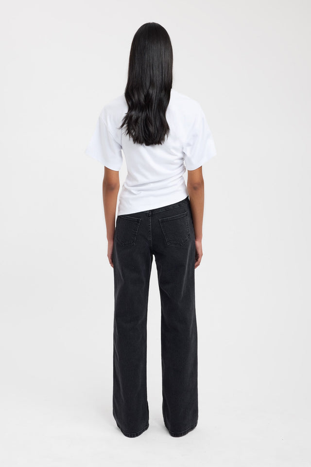 Explore the Nova Tee womens-blouse in white with fitted round neckline and short sleeves on-body