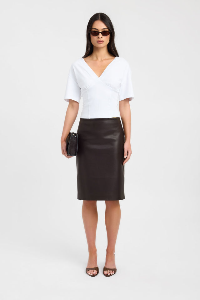 Showcasing the Levi Tee womens-blouse in white with fitted silhouette, v-neck and short sleeves front