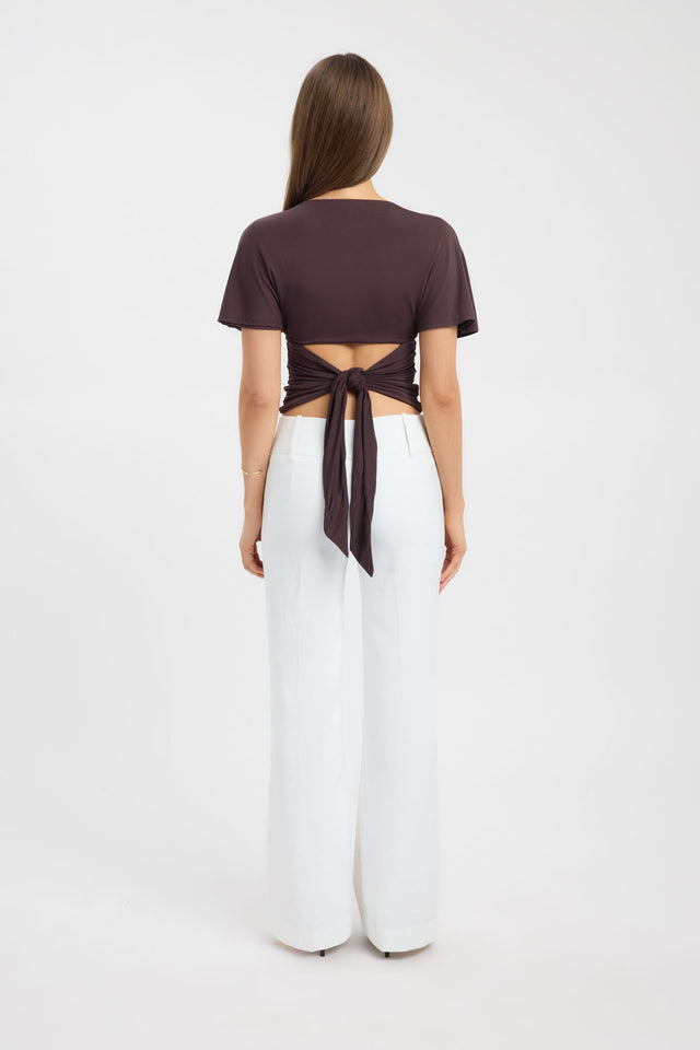 Explore the Isla Top womens blouse in brown with fitted v-neck and short sleeves side