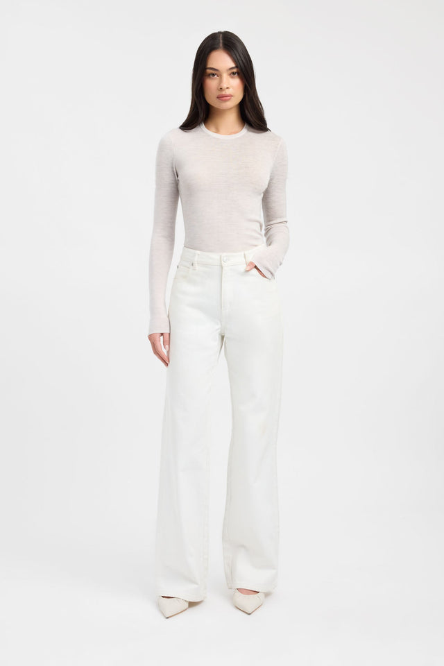 Showcasing the Jackson Crew Neck Top womens-blouse with fitted silhouette, round neckline, and full straight sleeves in oldlace and silver on-body