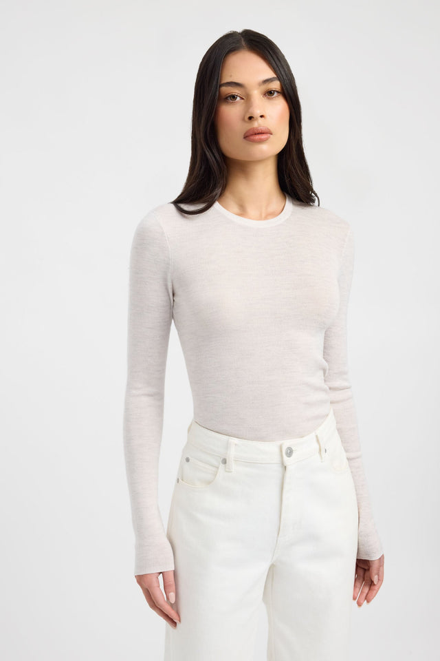 Featuring the Jackson Crew Neck Top womens-blouse with fitted design, round neckline, and full straight sleeves in oldlace and silver front