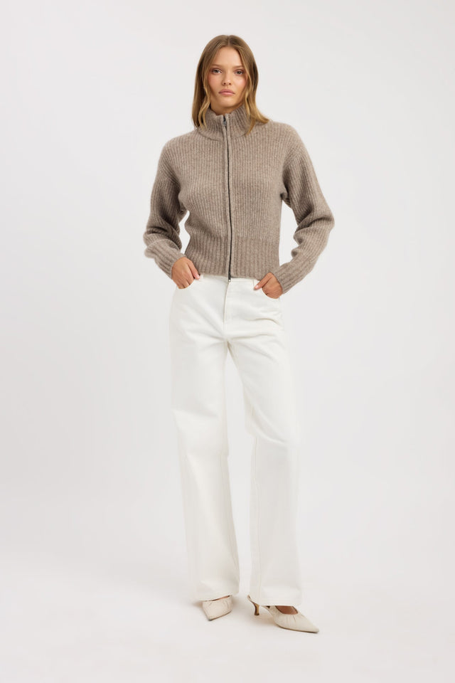 Showcasing the Irina Zip Cardigan womens jumper with high-neck and fitted silhouette in tan on-body