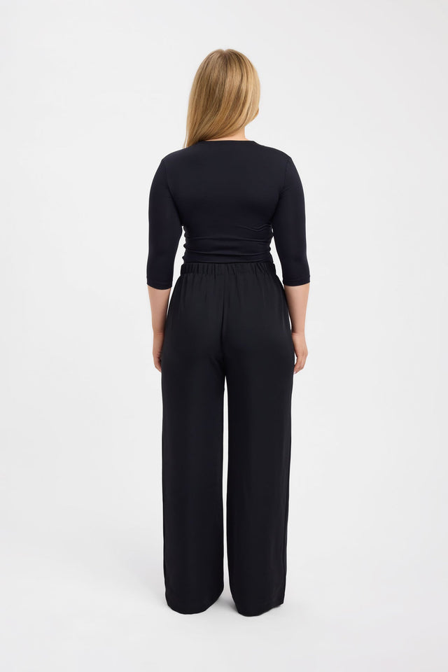View of the Riley Lace Top womens-blouse in black featuring fitted silhouette with three-fourth sleeves product
