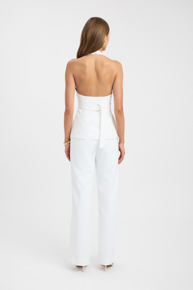 Displaying the Ariel Wrap Top womens blouse in white with fitted sleeveless v-neck back