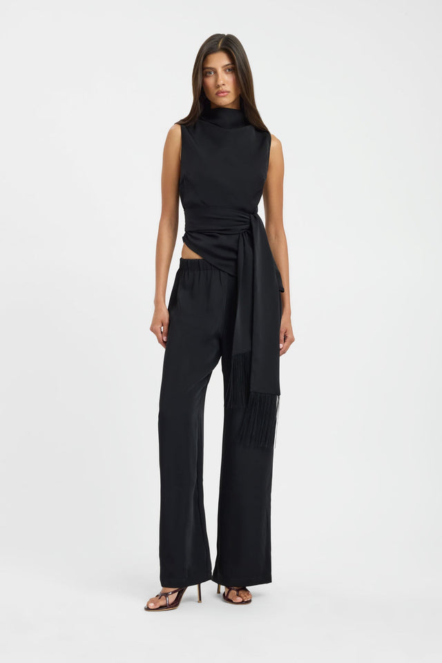 Showcasing the Maria Fringed Sash Top womens-blouse in black with fitted high-neck sleeveless design front