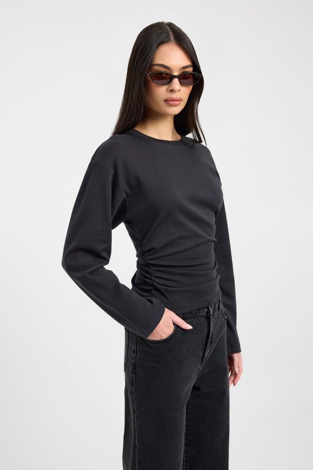 Showcasing the Nova Long Sleeve Top womens-blouse in black with fitted silhouette and round neckline side
