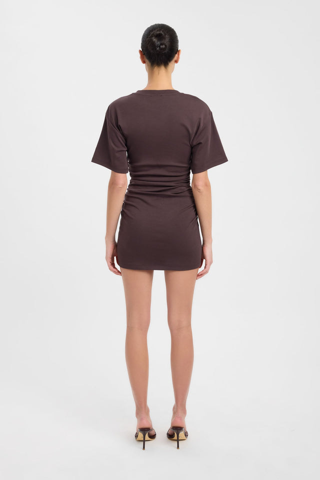 Highlighting the Nova Mini Dress in bodycon mini with fitted round neckline and rosy brown tone back
