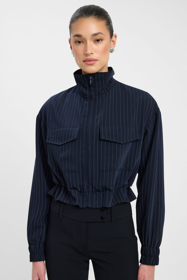 Featuring the Oslo Bomber womens coats and jackets with full sleeves in short bomber style crafted from navy and white pinstripe fabric detail