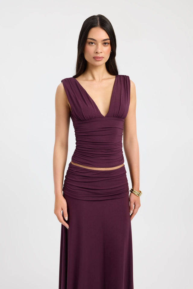 Featuring the Solis Top womens blouse in maroon with fitted v-neck sleeveless styling detail