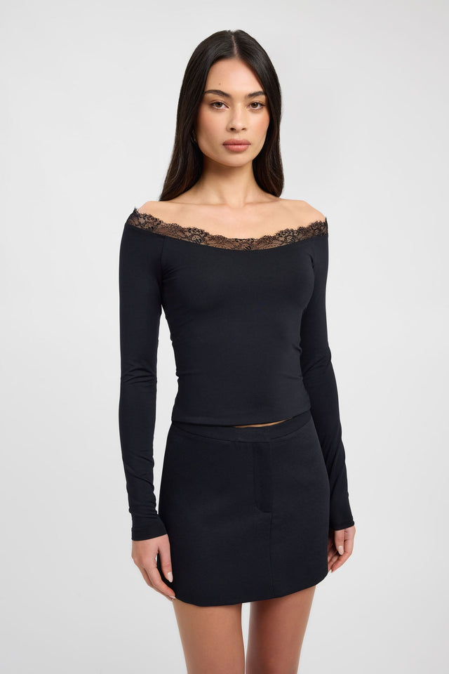 Featuring the Tani Lace Top womens blouse in black with fitted straight neckline and full sleeves detail