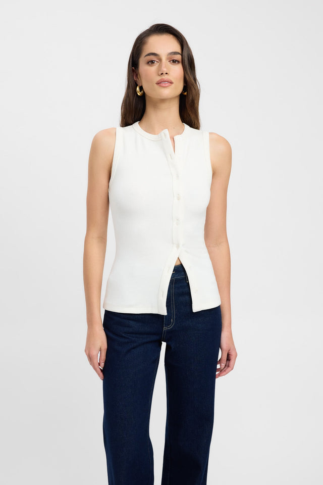 Featuring a Bec Button Tank womens singlet with fitted silhouette and collared round neckline in white front