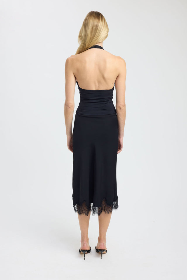 Showcasing the Lila Lace Top womens-blouse in black with fitted silhouette, plunge neckline and sleeveless design back
