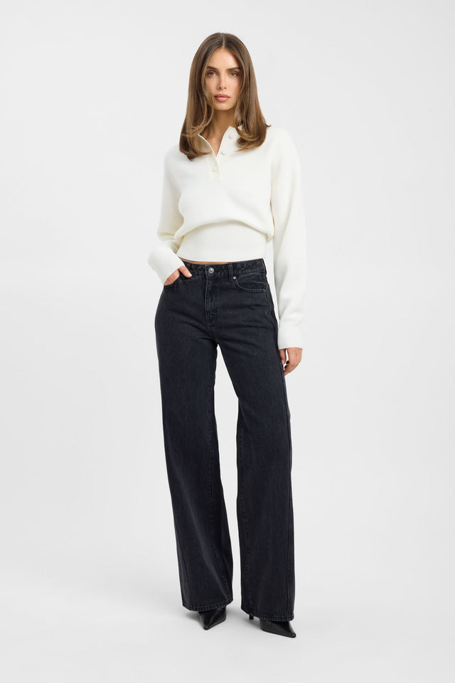 Showcasing the Dalton Polo Jumper womens jumper with v-neck, relaxed fit in ivory on-body